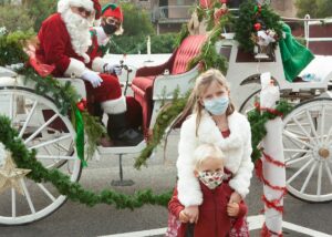 Sensitive Santa in coach with children