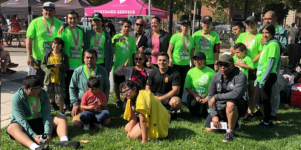 2023 Mighty Milers team with coaches HM1 LaToddin Washington and Sgt. Anthony Flores (Sergeant) of the USMS (United States Marine Corps)