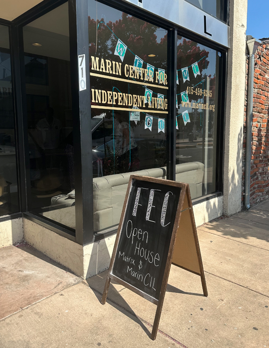 the doorway of the Marin CIL office at 710 4th Street in San Rafael, California